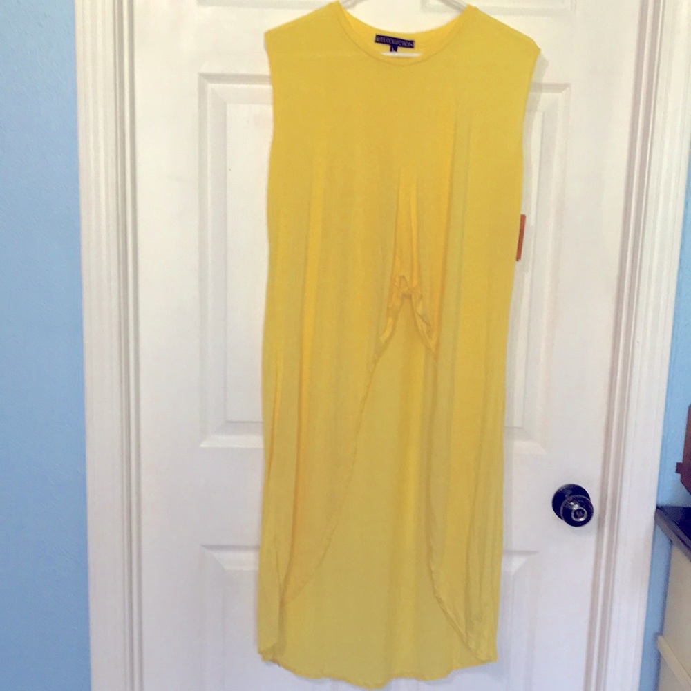 High low top with knot detail.